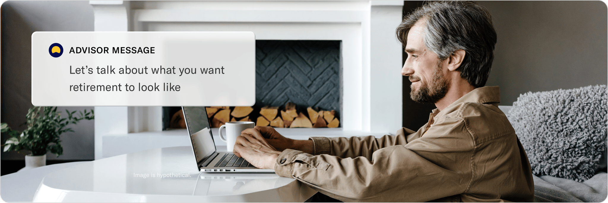 Man on a sofa smiling while using his phone