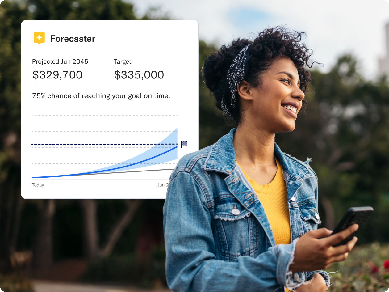 A woman smiling at her phone